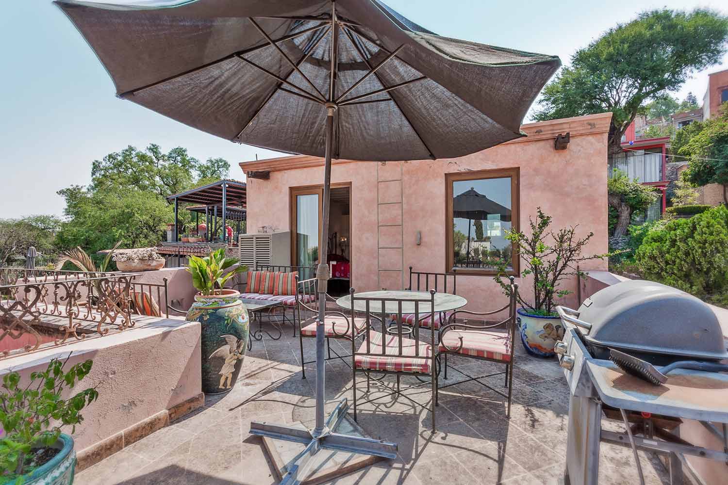 Casa de la Vista Roof Terrace With View Towards House And Gas Grill