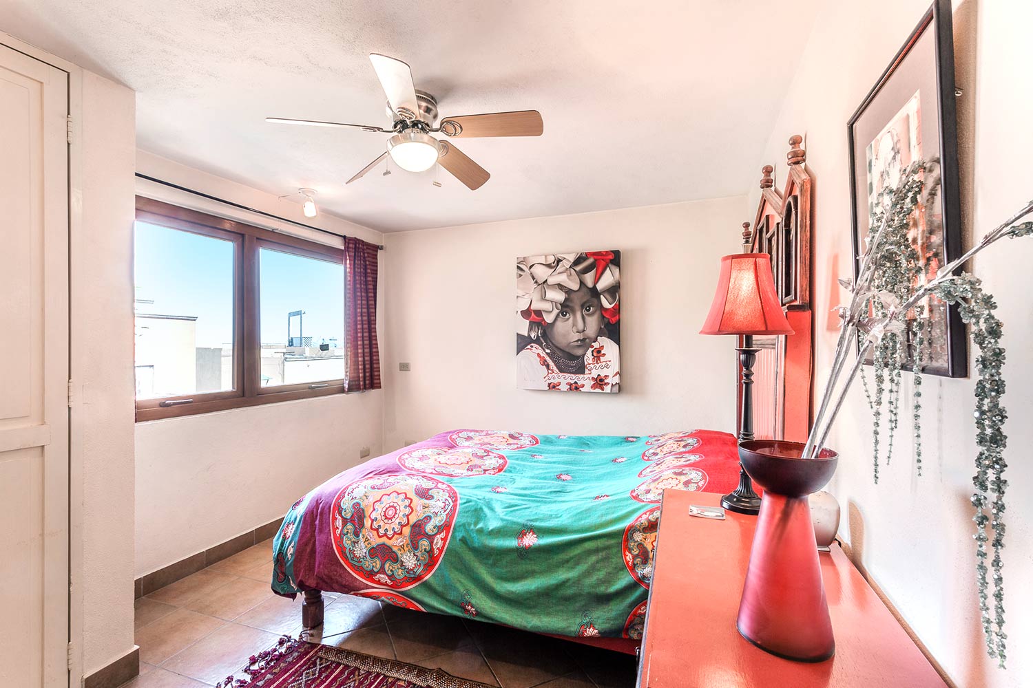 Photo of Casa de la Vista Second Floor Bedroom With a Closet, Ceiling Fan, Dresser and Lots of Light